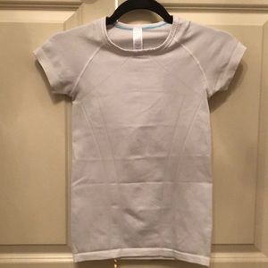 white ivivva form fitting tee